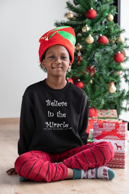 Child "Believe in the Miracle" Long Sleeved Heavy Blend Christmas Sweatshirt